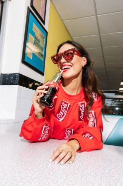 New Queen Of Sparkles Scatter Coca-Cola® Can Sweatshirt Red