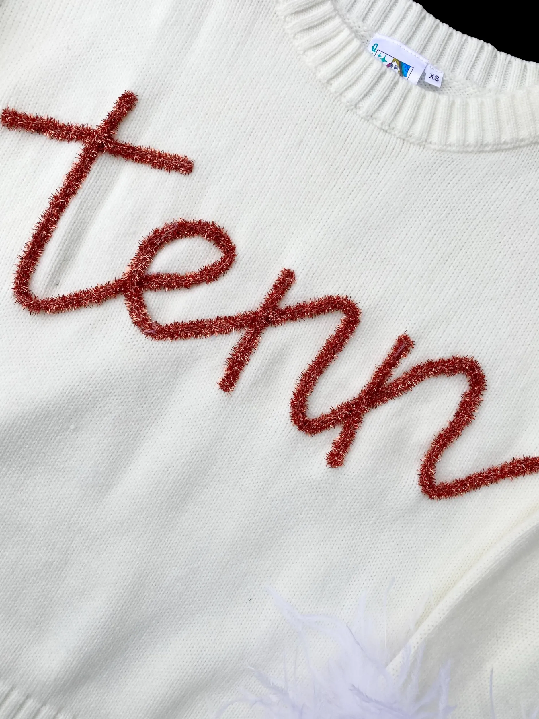 Discount Queen Of Sparkles Tenn Feather Sleeve Sweater